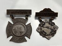 Front view of both Ohio National Guard marksman badges