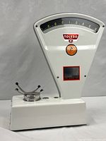 Full view of white Toledo counter scale