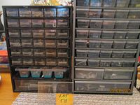 Two plastic drawer cabinets side by side, filled with hardware