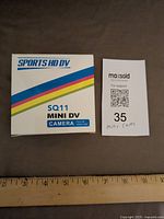 Retail box front showing Sports HD DV SQ11 Mini DV Camera branding