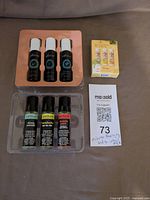 All nine items grouped: Scentuals trio, TheraWell trio, boxed lip balms