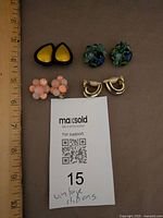 front view showing all four pairs with ruler for scale