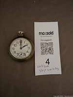 Front view showing dial and numerals