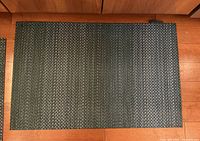 Full view of Chilewich Quill floor mat showing chevron pattern
