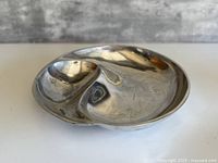 Top view showing yin-yang divided wells