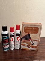 Williams-Sonoma torch box, BernzOmatic butane can, two Ronson butane cans