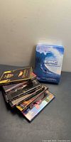 All DVDs stacked with Epic Conditions tin upright