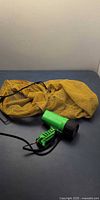 Flashlight and bag together showing overall lot