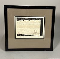 Front view of framed woodblock print with mat and frame
