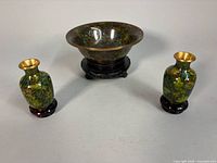 Bowl and both vases on stands, group view