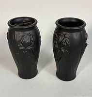 Both vases front view showing shape, finish and floral relief
