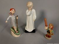 All three figurines grouped together