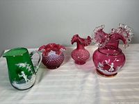 Four glass pieces lined together for scale and overview