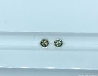 Front view of both loose round diamonds