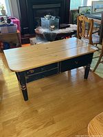Full view of coffee table front and drawers