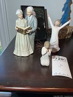 Group shot of all three figurines on tabletop