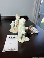 All three figurines on display