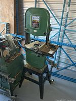 Full view of Craftex band saw on stand and wheeled base