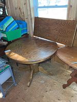 top view of round oak pedestal table