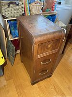 Left side and top surface showing finish wear and scuffs