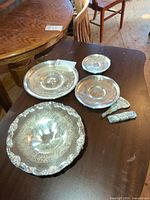 Group shot of all silver-plated items on table