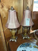 Full view of both lamps on table showing shades and bases