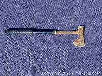 Full view of 26-inch Estwing axe showing head and handle