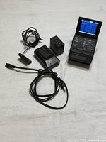 Recorder with LCD open, battery, charger, cables