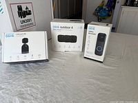 All three boxed Blink devices on table