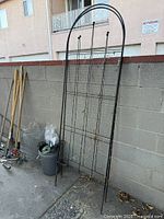 Overall view with trellis, tools, wire and bucket