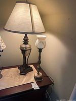 Both lamps on dresser showing relative sizes and shades