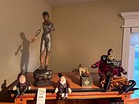 Group shot showing all figurines on cabinet