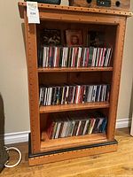 Front view of solid pine bookshelf showing shelves and finish