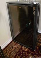 Front view of Sunbeam wine cooler showing full unit with glass door