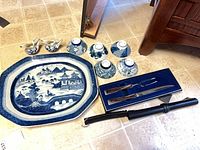 Group shot of platter, bowls, pitchers, carving set and honing steel