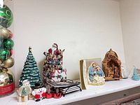 Shelf view of all listed Christmas décor items