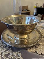 Bowl affixed to plate showing overall form and attachment