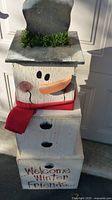 Front view of stacked snowman decoration