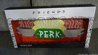 Front view of boxed Friends Central Perk LED neon light