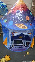 Front view of space-theme play castle tent