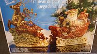 Retail box showing Santa sleigh and reindeer set