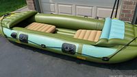 Full side view of green inflatable Gallivant Neva III boat