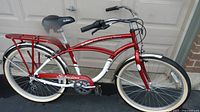 Full left-side view of red and white Schwinn Tim Hortons 40th Anniversary cruiser bicycle.