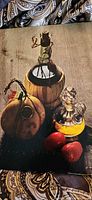 Front cover with still-life image of wine flask, decanter, produce