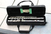 Open case showing disassembled flute sections inside