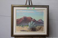 Full view of framed desert landscape painting