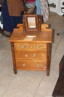 Front view of dresser with mirror attached