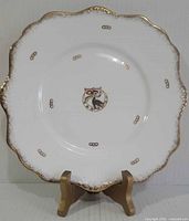 Front view of Royal Stafford Rebekah square luncheon plate on stand