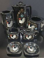 Full set frontal view showing rooster motifs and quantity