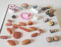Overhead view of complete lot showing all 28 miniature food items